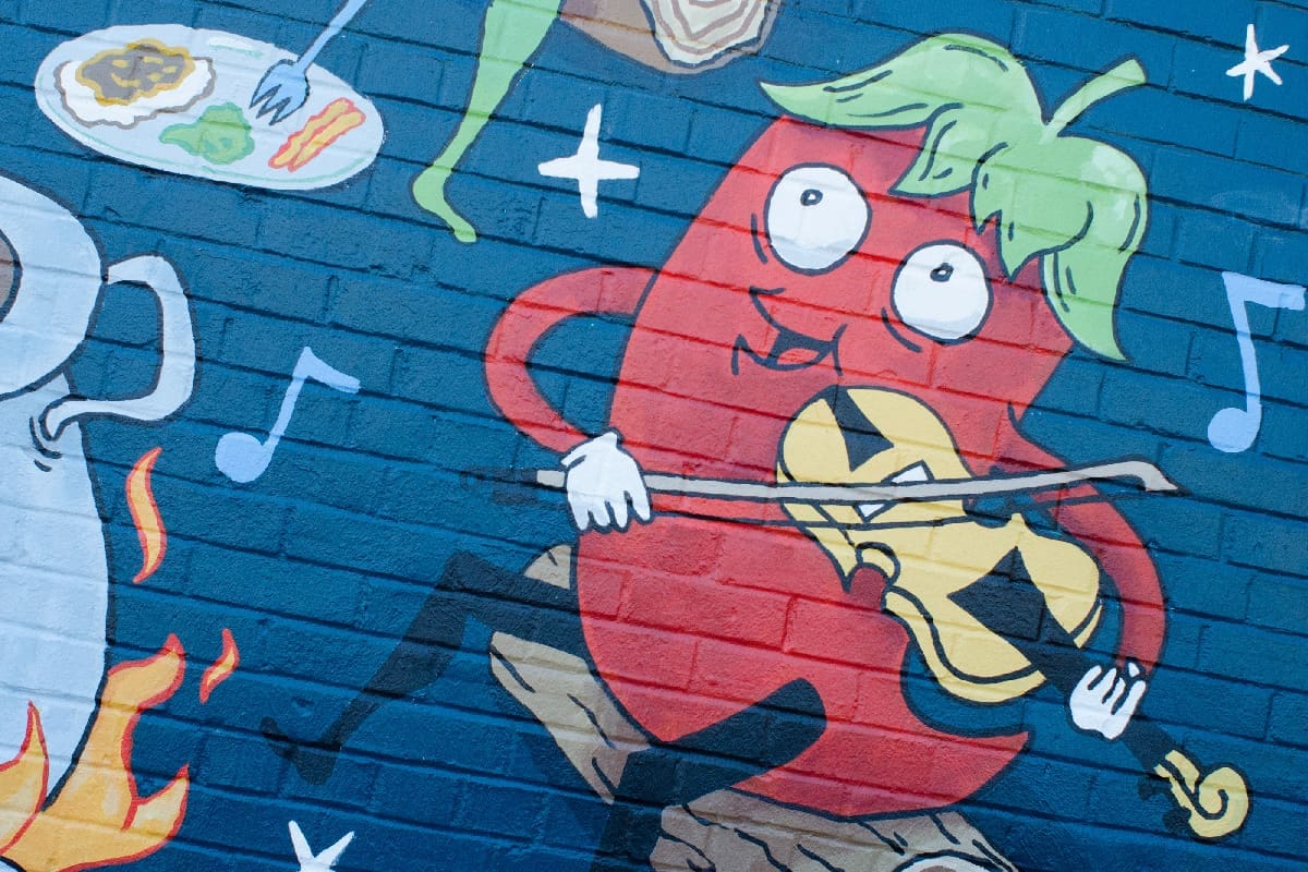 excerpt of dat dog mural in downtown lafayette louisiana