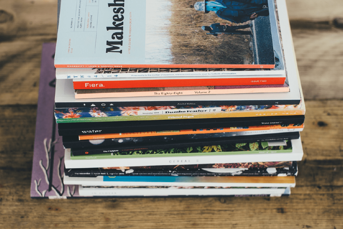 stack of different types of catalogs